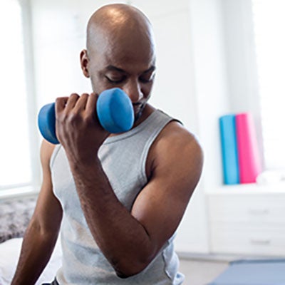 Man working out with dumbells