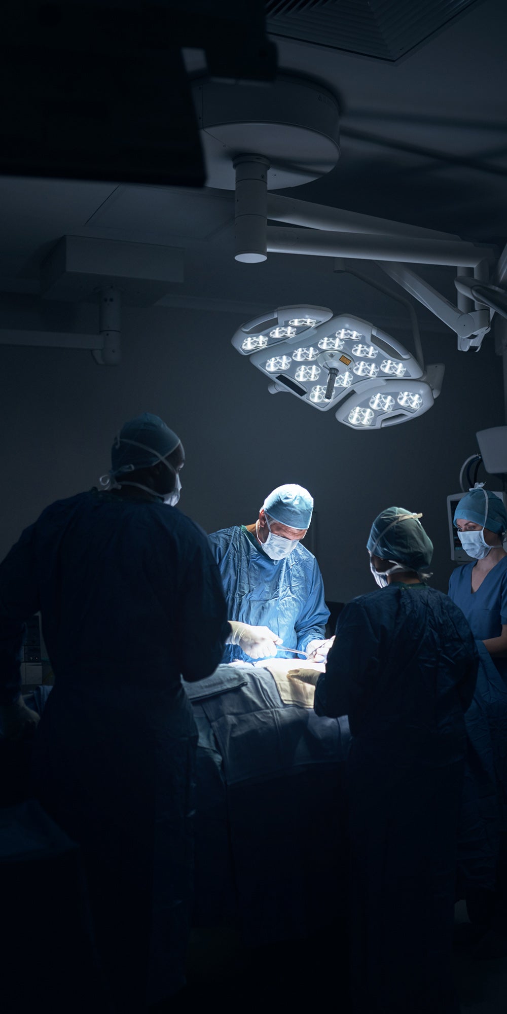 doctors performing surgery