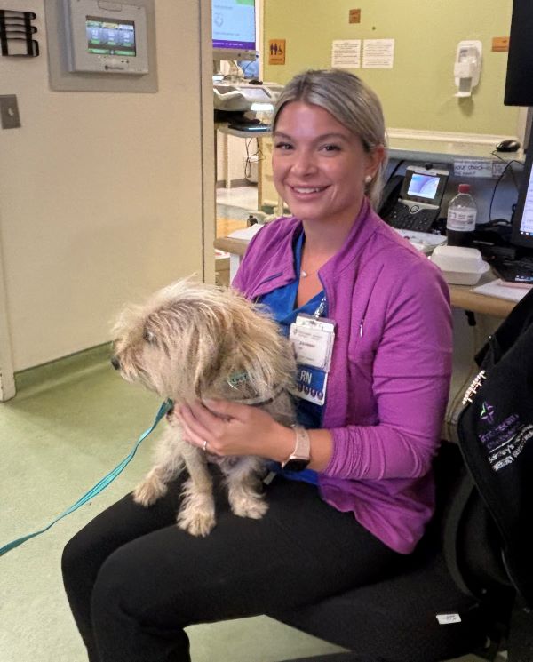 ED nurse, Savannah, took a few minutes to dog sit with Barry.