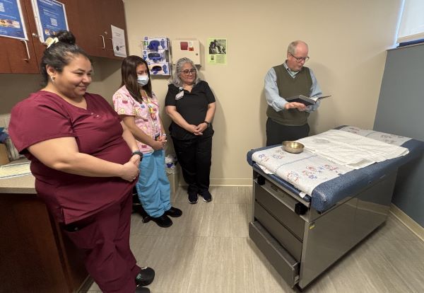Family Health Center colleagues served as witnesses