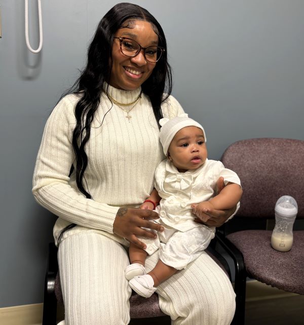 Baby Jrue's mother, Sharline, asked Dr. Doolittle if he would perform this sacrament.