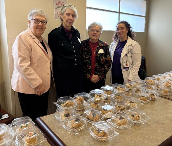 Sisters giving Zeppoles