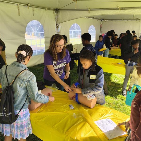Students learn STOP THE BLEED® during event breakout sessions. 