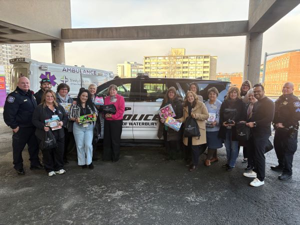 Members of the Waterbury Police Department, Brian Gibbons Homeless Outreach and colleagues of Saint Mary's Hospital