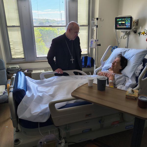 Bishop Betancourt visits patients in Saint Mary's Hospital