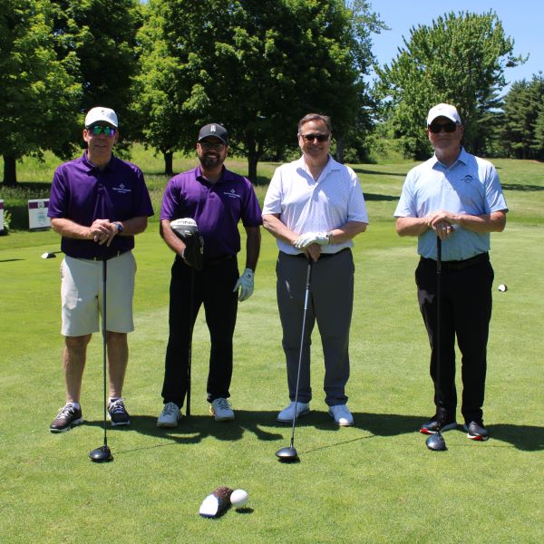 (Left to right): Tim Stanton Trinity Health Of New England Regional Vice President, Husnain Kermalli, MD, Saint Mary's Hospital Chief Medical Officer, Waterbury Mayor Paul Pernerewski and Chief of Staff Joe Geary participate in the 2026 Golf Invitational.
