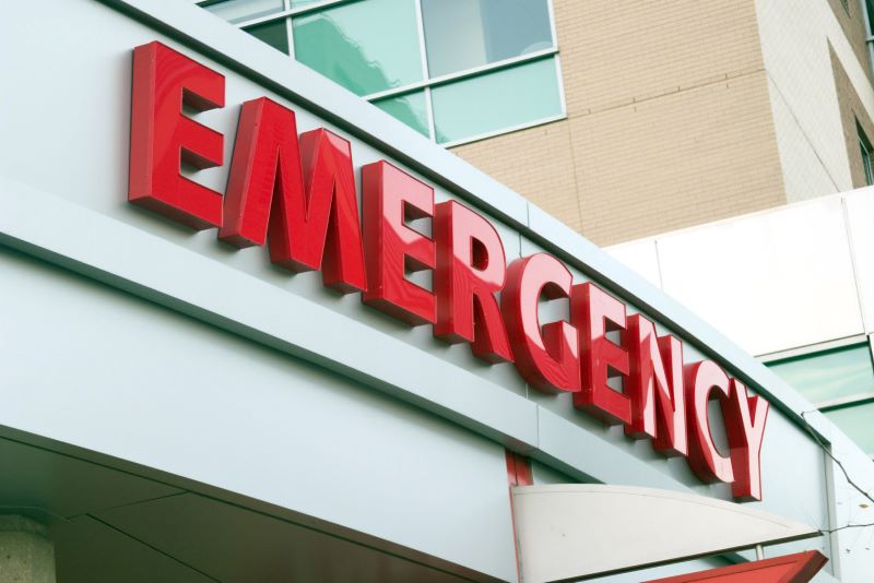 Emergency sign at a hospital entrance.