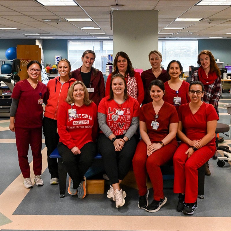Colleagues Wear Red to Support the Fight Against Heart Disease