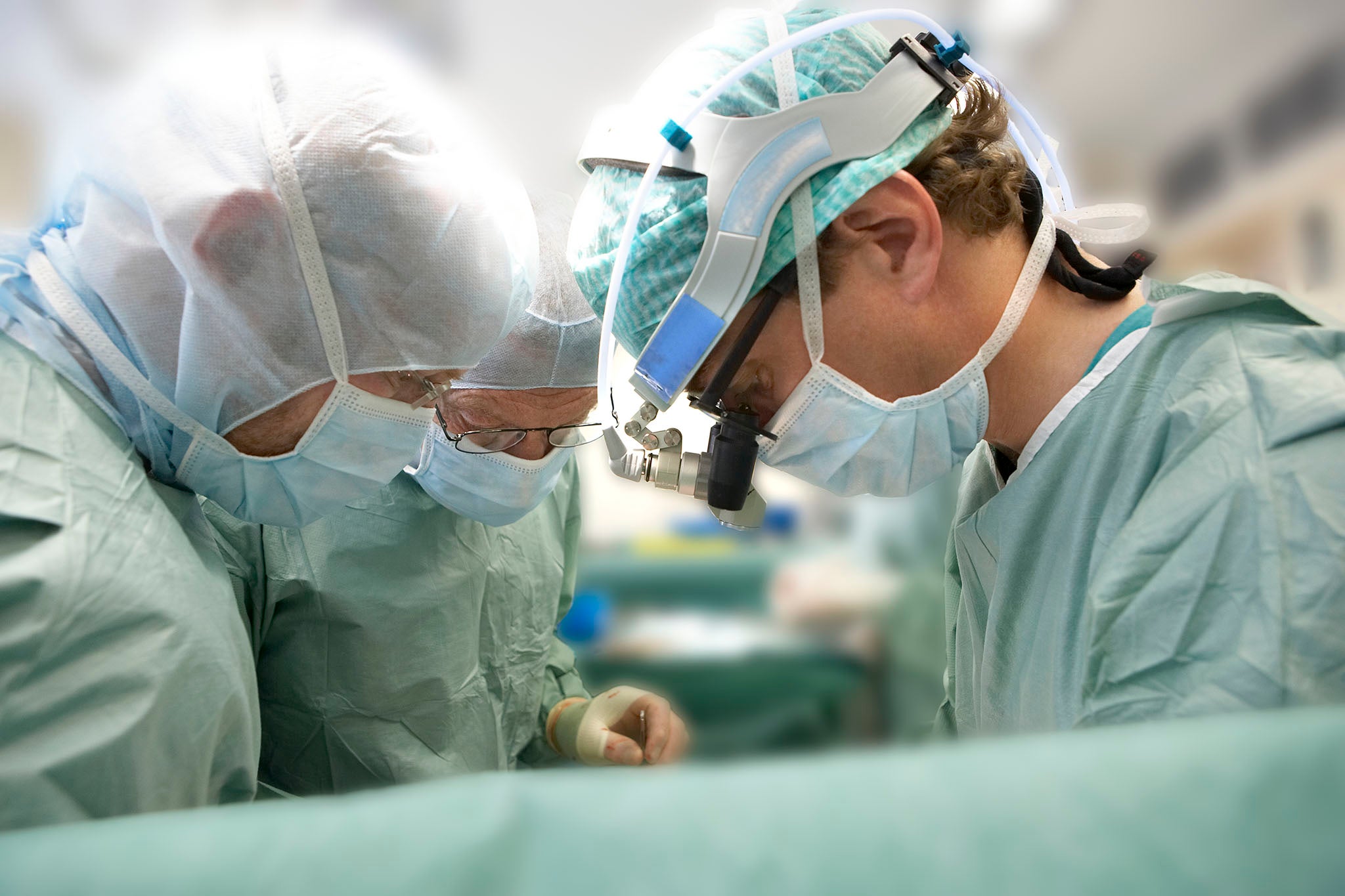 doctors performing surgery