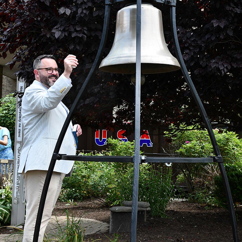 Mike Rogers ringing bell