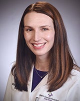 Caitlin M Reynolds